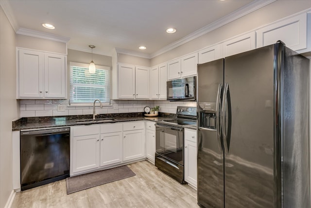421 Bristol Rd, Martinez, GA 30907 - kitchen featuring black appliances, light wood finished floors, white cabinets, ornamental molding, and tasteful backsplash