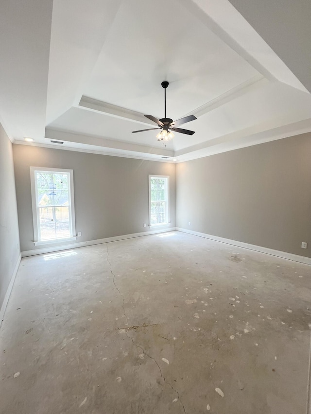 5015 Charnwood Forest Cir, Aiken, SC 29803 - empty room with a raised ceiling, baseboards, a ceiling fan, and unfinished concrete floors