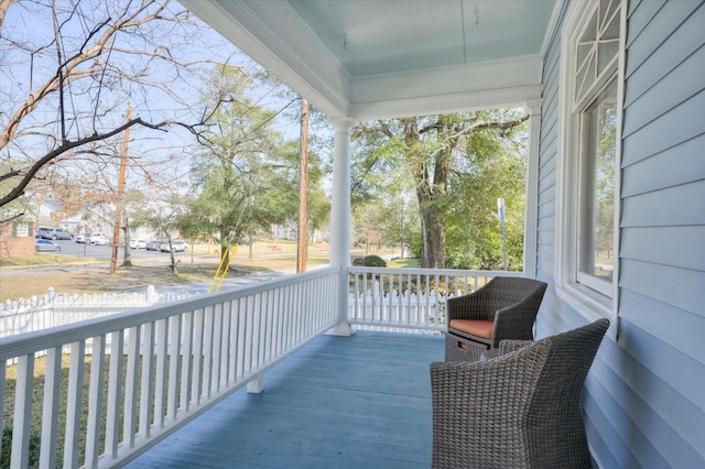 balcony featuring a porch