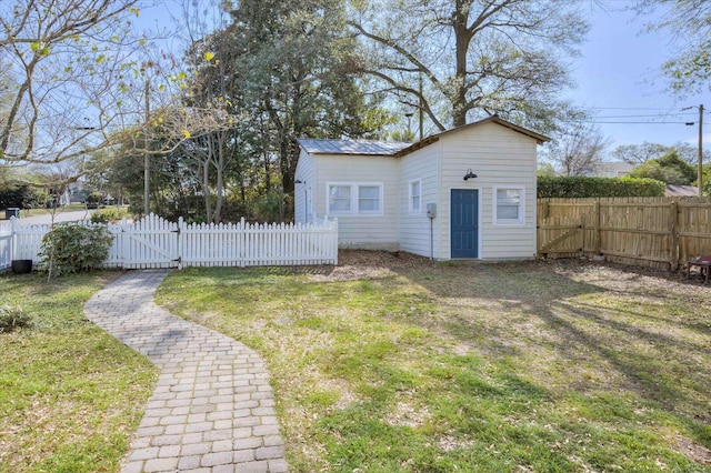 view of yard with fence private yard and a gate