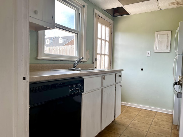 801 Monte Sano Ave, Augusta, GA 30904 - kitchen featuring dishwasher, a sink, freestanding refrigerator, light tile patterned floors, and baseboards