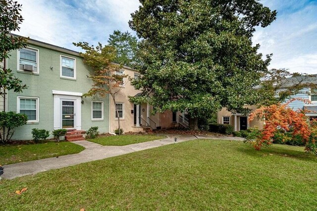 801 Monte Sano Ave, Augusta, GA 30904 - view of front of home featuring a front lawn, entry steps, stucco siding, and cooling unit
