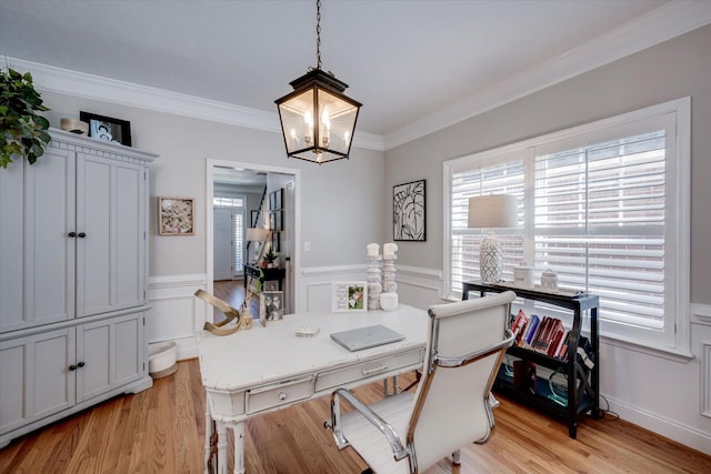 909 Nerium Trl, Evans, GA 30809 - home office with an inviting chandelier, ornamental molding, wainscoting, and light wood-style flooring