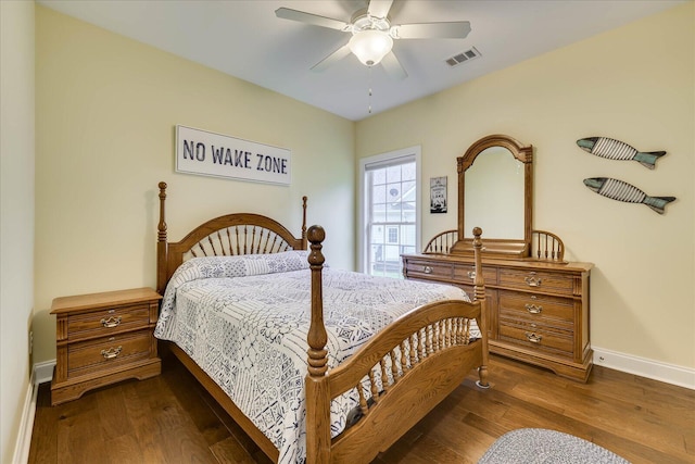 107 Stonebridge Loop, Mccormick, SC 29835 - bedroom featuring visible vents, baseboards, ceiling fan, and dark wood-style floors