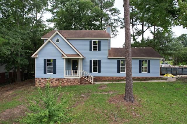 view of front of home featuring a front lawn