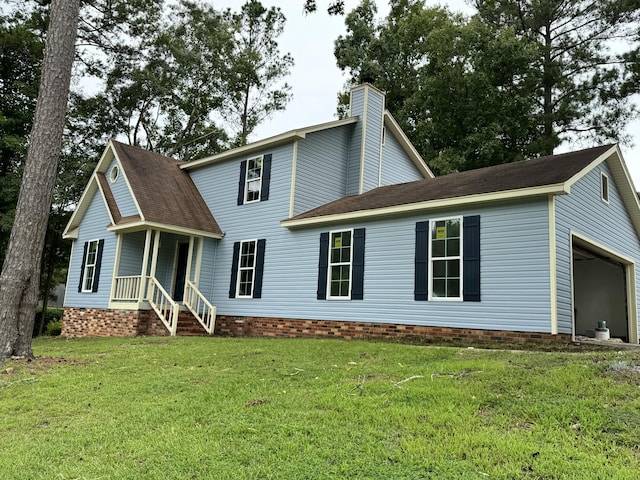 colonial inspired home featuring a front lawn