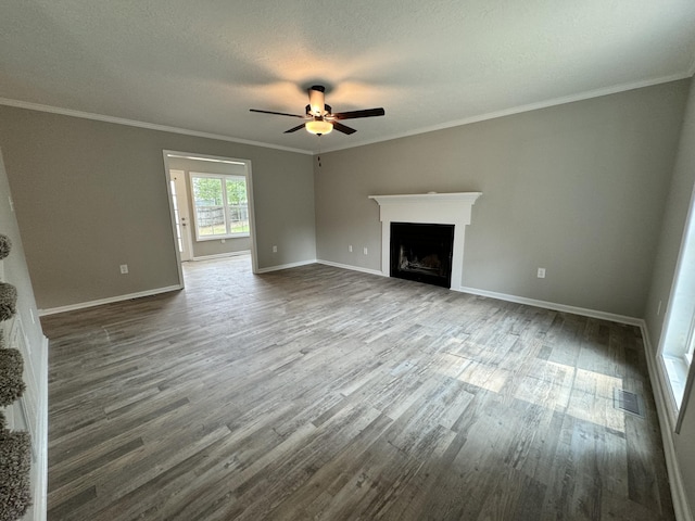 unfurnished living room with hardwood / wood-style floors, ceiling fan, crown molding, and a textured ceiling