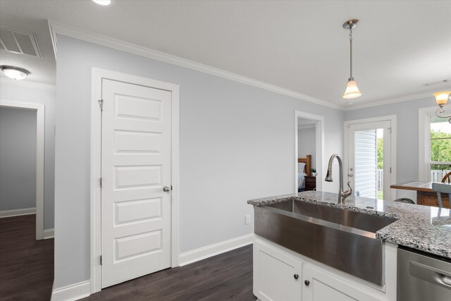 kitchen featuring white cabinetry, sink, light stone counters, stainless steel dishwasher, and pendant lighting