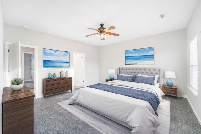 carpeted bedroom with ceiling fan