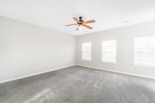 carpeted empty room with ceiling fan