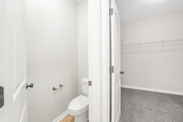 bathroom featuring toilet