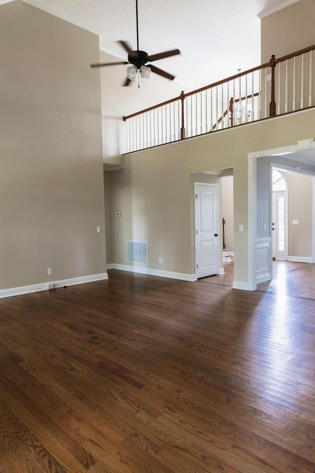 1212 Sumter Landing Ln, Evans, GA 30809 - unfurnished living room with a ceiling fan, dark wood-style floors, and a towering ceiling