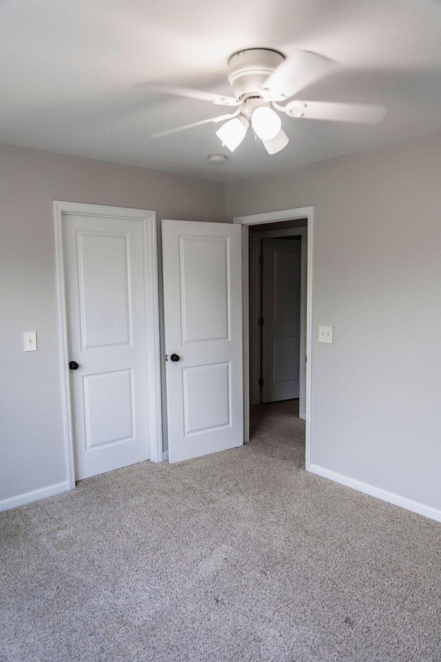 1212 Sumter Landing Ln, Evans, GA 30809 - unfurnished bedroom featuring carpet and a ceiling fan