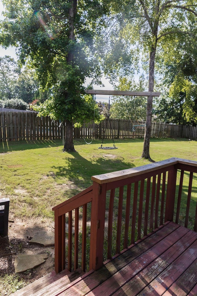 1212 Sumter Landing Ln, Evans, GA 30809 - wooden terrace featuring a fenced backyard and a playground