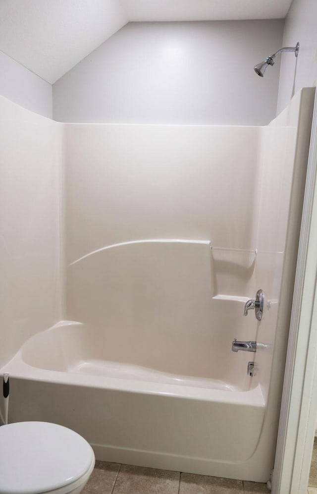 1212 Sumter Landing Ln, Evans, GA 30809 - full bathroom featuring shower / bathtub combination, tile patterned floors, and vaulted ceiling