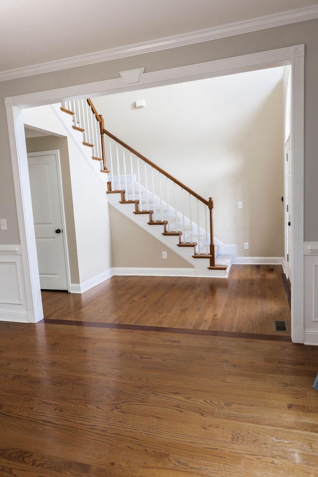 1212 Sumter Landing Ln, Evans, GA 30809 - foyer entrance with stairway, crown molding, and wood finished floors