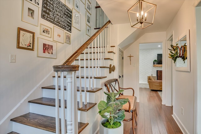 508 Scotts Way, Augusta, GA 30909 - stairs with hardwood / wood-style floors and a chandelier