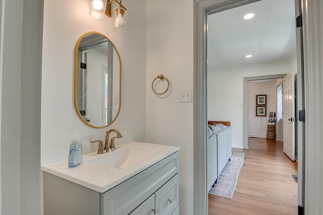 508 Scotts Way, Augusta, GA 30909 - bathroom featuring wood finished floors, vanity, crown molding, and recessed lighting
