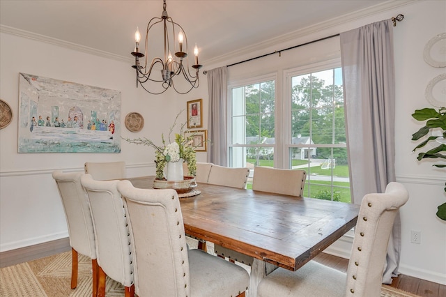 508 Scotts Way, Augusta, GA 30909 - dining area with a chandelier, crown molding, and wood finished floors