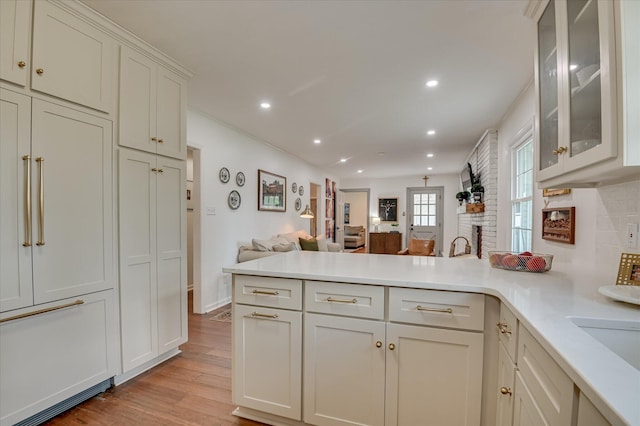 508 Scotts Way, Augusta, GA 30909 - kitchen featuring a peninsula, light wood-type flooring, light countertops, open floor plan, and recessed lighting