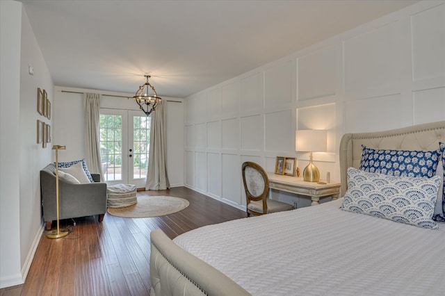 508 Scotts Way, Augusta, GA 30909 - bedroom with a decorative wall, access to outside, a chandelier, and wood-type flooring
