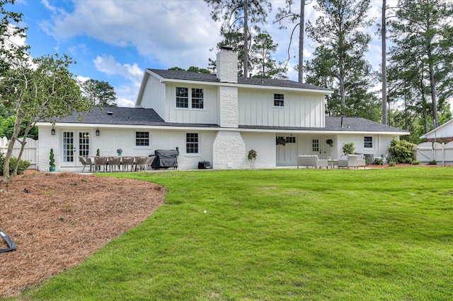 508 Scotts Way, Augusta, GA 30909 - back of house featuring french doors, a chimney, a patio, and a lawn