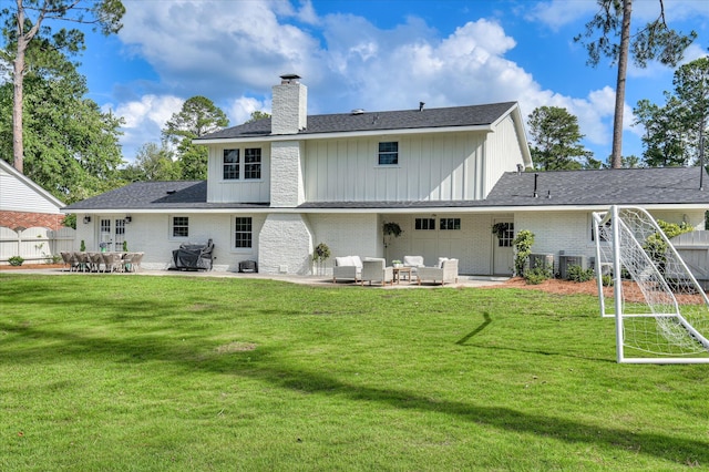508 Scotts Way, Augusta, GA 30909 - back of property with a chimney, a patio, brick siding, and board and batten siding
