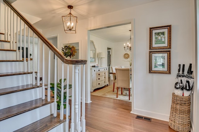 508 Scotts Way, Augusta, GA 30909 - foyer entrance featuring a chandelier, stairs, and light wood-type flooring