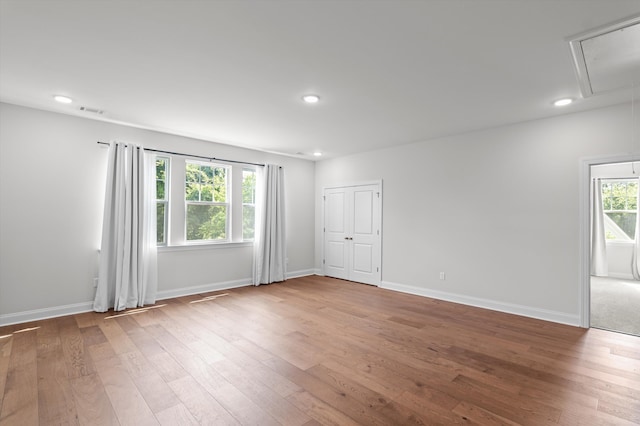 461 Rivernorth Dr, North Augusta, SC 29841 - spare room featuring attic access, hardwood / wood-style flooring, and recessed lighting