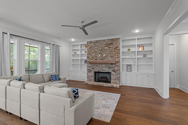 461 Rivernorth Dr, North Augusta, SC 29841 - living room featuring a ceiling fan, ornamental molding, dark wood-style floors, a brick fireplace, and recessed lighting
