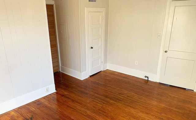 1424 Arsenal Ave, Augusta, GA 30904 - unfurnished bedroom featuring baseboards and dark wood-style floors
