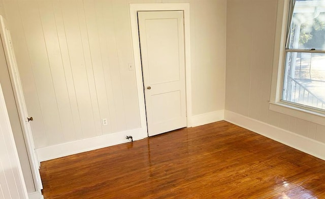 1424 Arsenal Ave, Augusta, GA 30904 - spare room with dark wood-type flooring and healthy amount of natural light