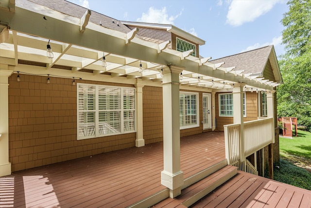 wooden deck with a pergola