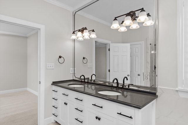 bathroom with vanity and ornamental molding