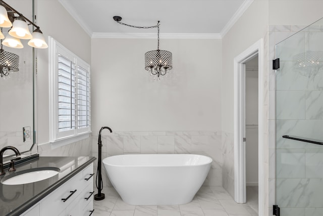 bathroom with vanity, crown molding, independent shower and bath, and tile walls