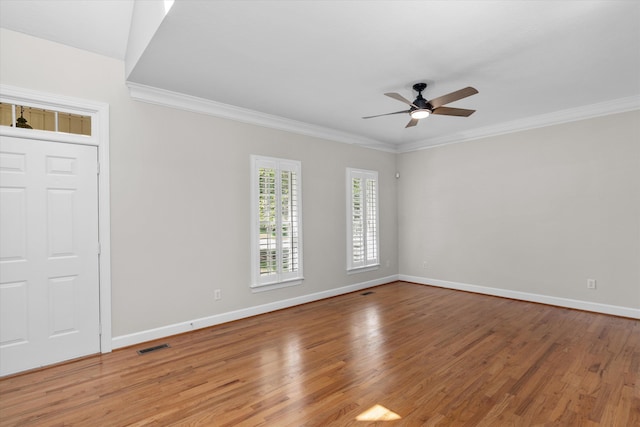 interior space featuring crown molding, hardwood / wood-style floors, and ceiling fan