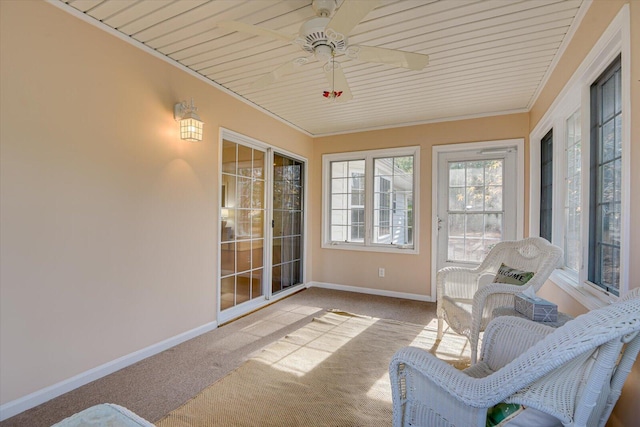 sunroom / solarium with ceiling fan