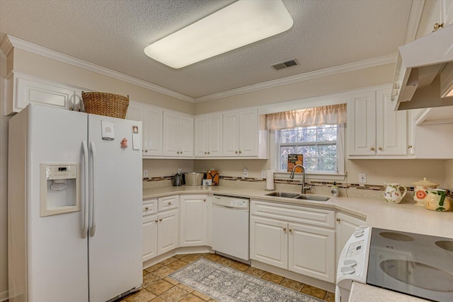 kitchen with sink, crown molding, a textured ceiling, white appliances, and white cabinets