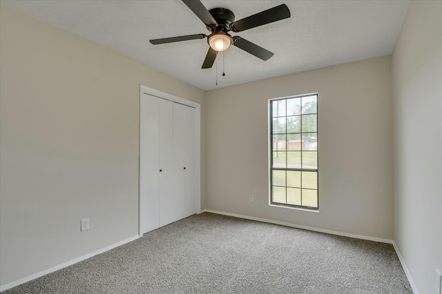 3204 Bel Ridge Rd, Augusta, GA 30909 - unfurnished bedroom with carpet floors, a closet, a ceiling fan, and baseboards