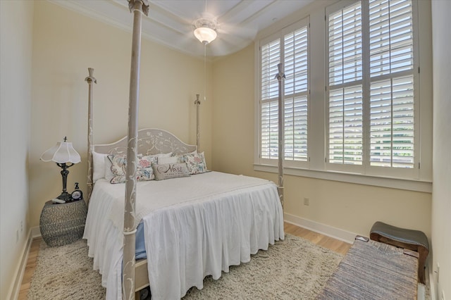 2349 Williams St, Augusta, GA 30904 - bedroom with wood finished floors, baseboards, ornamental molding, and a ceiling fan