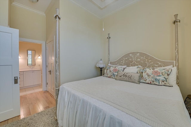2349 Williams St, Augusta, GA 30904 - bedroom with light wood-type flooring, ornamental molding, and ensuite bath