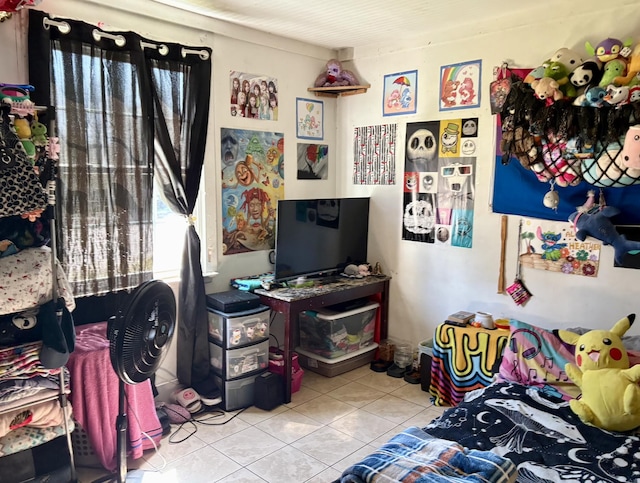 bedroom featuring tile patterned flooring