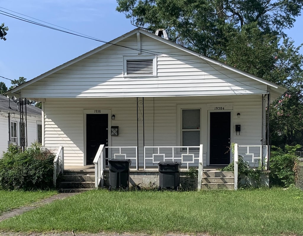 1938 Starnes St, Augusta, GA 30904 - view of front of home featuring covered porch and a front lawn