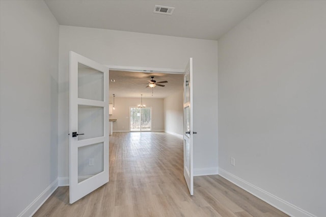 bathroom featuring vanity, wood-type flooring, and walk in shower