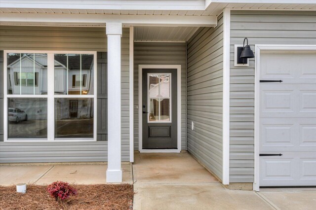 property entrance with a porch