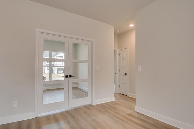 empty room featuring light colored carpet