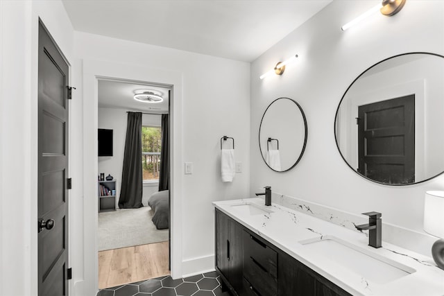 1008 Folly Run Dr, Lincolnton, GA 30817 - ensuite bathroom featuring double vanity and baseboards