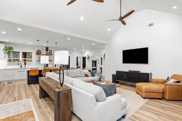 1008 Folly Run Dr, Lincolnton, GA 30817 - living room with a ceiling fan, recessed lighting, light wood finished floors, and high vaulted ceiling