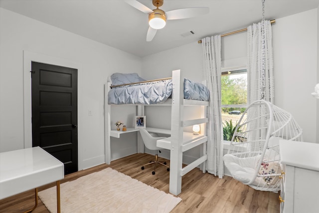 1008 Folly Run Dr, Lincolnton, GA 30817 - bedroom with wood finished floors, an office area, and a ceiling fan