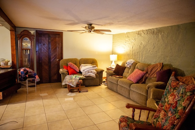 tiled living room featuring ceiling fan